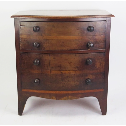 1699 - A 19th century mahogany bow fronted chest, containing two deep drawers, raised on bracket feet. 65cm... 