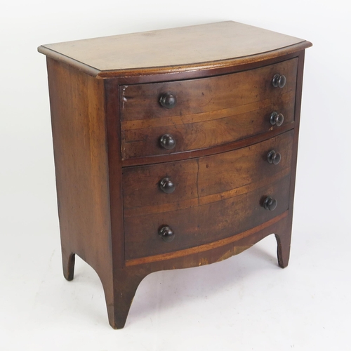 1699 - A 19th century mahogany bow fronted chest, containing two deep drawers, raised on bracket feet. 65cm... 