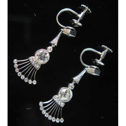 272 - A Pair of Art Deco Style Diamond Drop Pendant Earrings in platinum setting, c. 5.3mm old cut princip... 