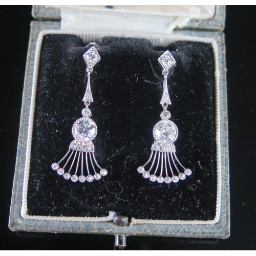 272 - A Pair of Art Deco Style Diamond Drop Pendant Earrings in platinum setting, c. 5.3mm old cut princip... 