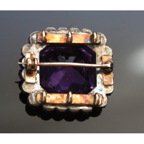 293 - An Antique Amethyst and Chrysolite Brooch, 14.2x12.9mm principal stone, converted from a three stran... 