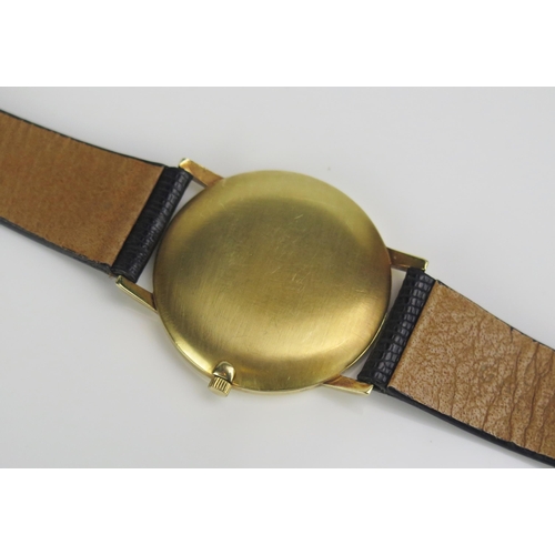 438 - A GARRARD 18ct Gold Quartz Wristwatch, 33mm case back no. 2399. In Garrard box, needs new battery, n... 