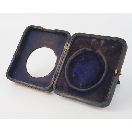 670 - A silver mounted watch holder, maker mark worn, Birmingham, 1915, of rectangular outline 11.5 x 10cm... 