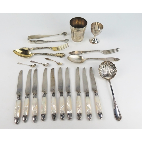 782 - A collection of continental silver wares including beaker, egg cup, sugar tongs assorted flatwares a... 