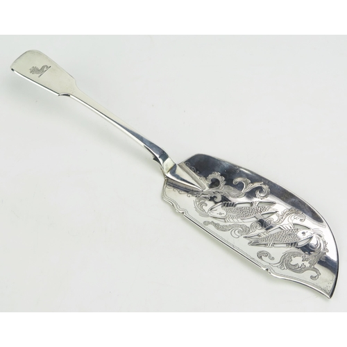 783 - A Victorian Irish silver fish slice maker James R Neill, Dublin, 1842, crested, the pierced blade wi... 