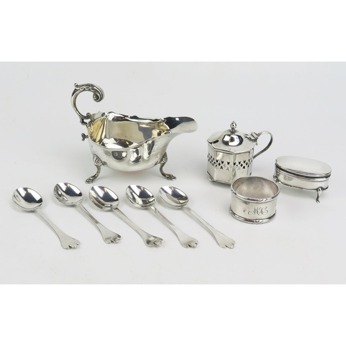 787 - A mixed collection of silver wares various makers and dates, including sauce boat, napkin ring, ring... 