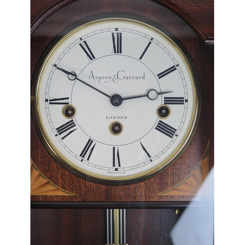 1192A - A modern Vienna style wall clock with 13cm Roman dial, signed Asprey & Garrard, London, the movement... 