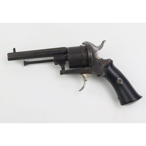 1333 - A Belgian or French pin fire six shot revolver, with ebonised grip, 19cm long.