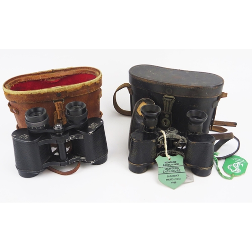 1340 - A pair of Omega 8 x 30 field glasses in leather case, together with another pair of field glasses.