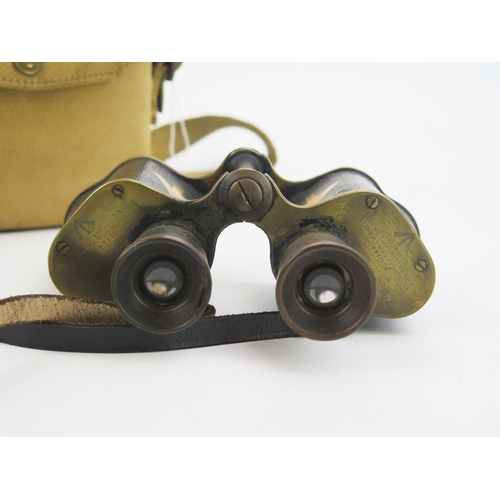 1348 - Ross, London, a pair of army issue field glasses contained in a khaki canvas case.