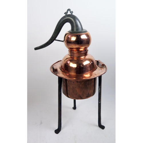 1684 - A 19th century French  polished copper still, with swept metal spout, with cylindrical reservoir, mo... 