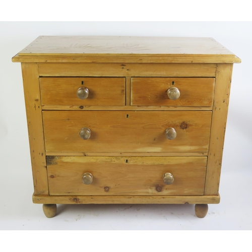 1703 - A stripped pine rectangular chest, the top with a moulded edge, containing two short and two long dr... 