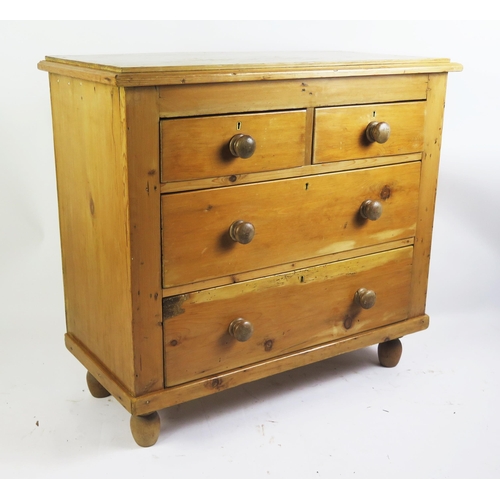 1703 - A stripped pine rectangular chest, the top with a moulded edge, containing two short and two long dr... 