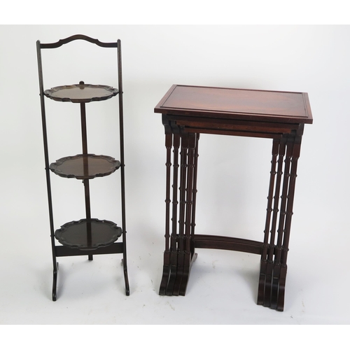 1710 - A nest of quartetto mahogany tables, on dual column trestle end supports with swept feet, 50cm wide,... 