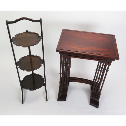 1710 - A nest of quartetto mahogany tables, on dual column trestle end supports with swept feet, 50cm wide,... 