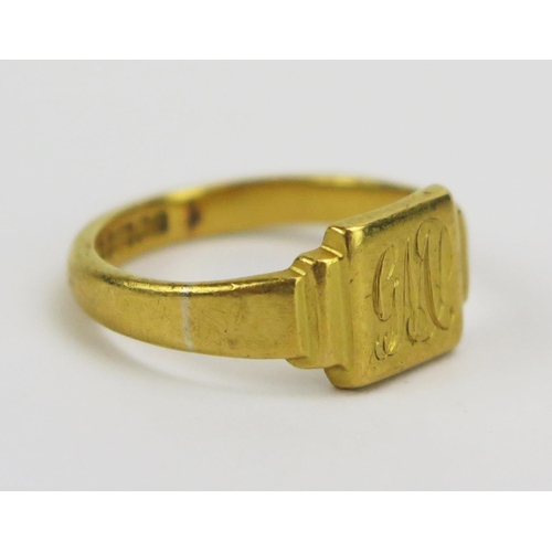 328 - A 22ct Gold Signet Ring engraved with the initials GW, size K, Birmingham 1958, 4.9g