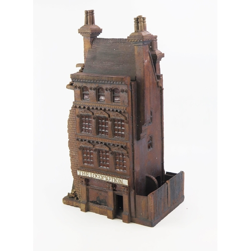 1164 - Ned Heywood of Chepstow, architectural stoneware sculpture of a partially war torn Victorian pub 'Th... 