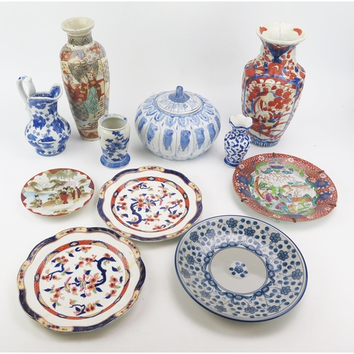 1219 - A mixed collection of ceramic wares including a Chinese Imari vase, two blue and white vases, a melo... 