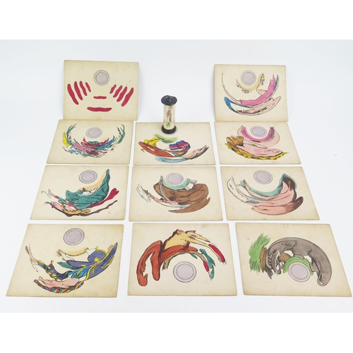 1308 - A set of twelve mirror anamorphosis cards, possibly French, circa 1860, twelve hand-coloured lithogr... 