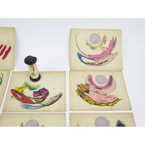 1308 - A set of twelve mirror anamorphosis cards, possibly French, circa 1860, twelve hand-coloured lithogr... 