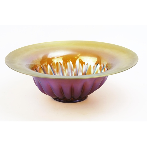 1638 - A WMF Myra series iridescent glass bowl, with flared rim and fluted body, on a circular foot, 32cm d... 