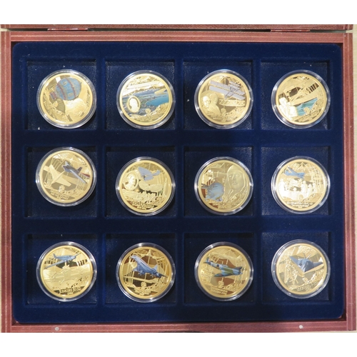 1433A - A collection of twelve History of Aviation medallions, contained in a mahogany case.