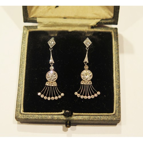 272 - A Pair of Art Deco Style Diamond Drop Pendant Earrings in platinum setting, c. 5.3mm old cut princip... 