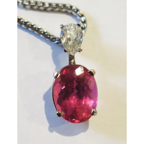 101 - An 18ct White Gold, Pink Tourmaline and Diamond Pendant on an 18ct white gold snake link chain, 11x8... 