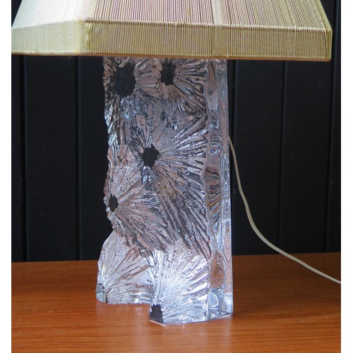 1068A - A Daum crystal glass table lamp of rectangular outline with cratered decoration, 32cm high, circa 19... 