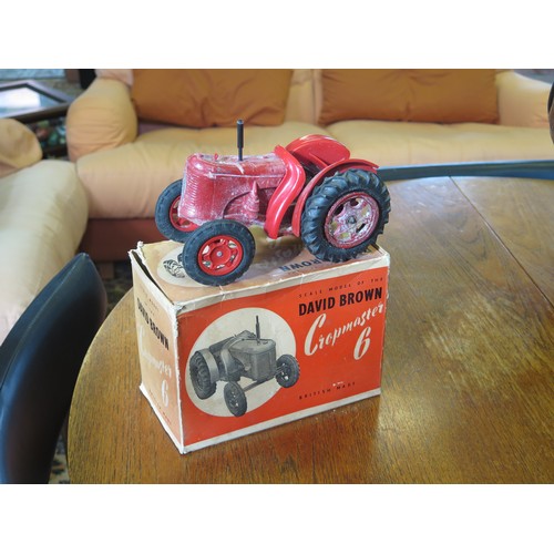 1287A - A  David Brown Cropmaster 6 diecast tractor, boxed, a treen crumb brush, two stone ware commemorativ... 