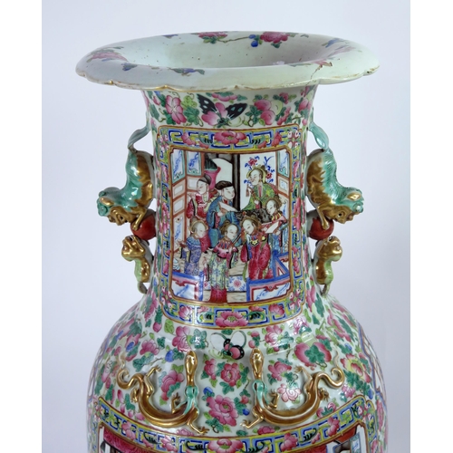 140 - A large 19th century Cantonese famille verte vase, of ovoid form, with flared rim, with handles in t... 