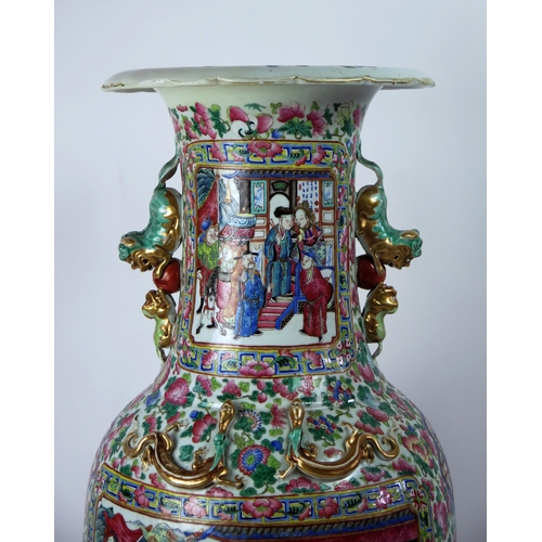 140 - A large 19th century Cantonese famille verte vase, of ovoid form, with flared rim, with handles in t... 