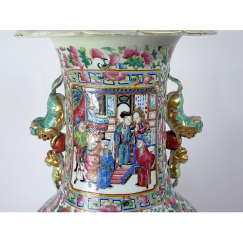 140 - A large 19th century Cantonese famille verte vase, of ovoid form, with flared rim, with handles in t... 