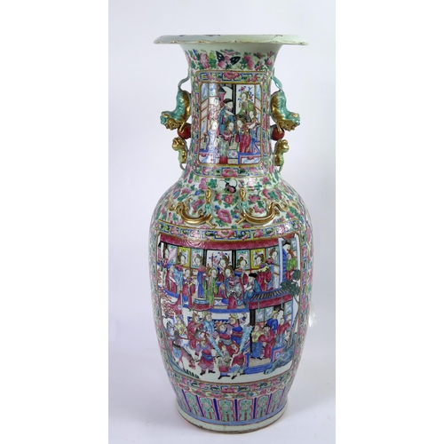 140 - A large 19th century Cantonese famille verte vase, of ovoid form, with flared rim, with handles in t... 