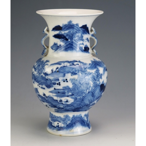 142 - A Chinese blue and white vase of baluster form, decorated with figures in an extensive landscape and... 