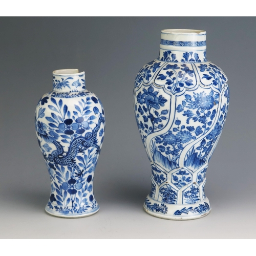 143 - A Chinese blue and white vase of ovoid form decorated with panels of floral sprays, with raised lotu... 