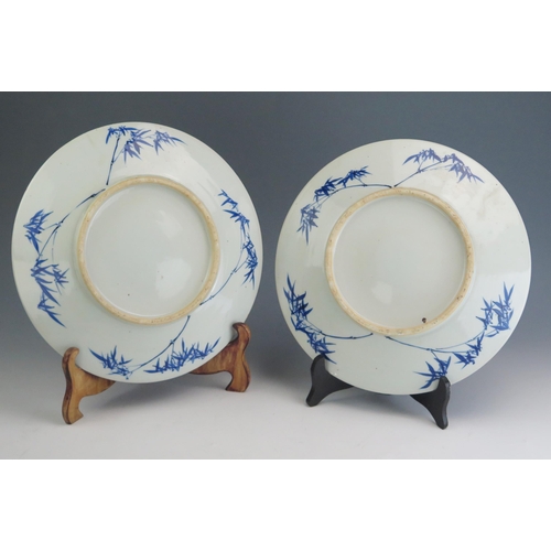 144 - A pair of Qing Chinese blue and white chargers, with all over prunus decoration, 37cm diameter.