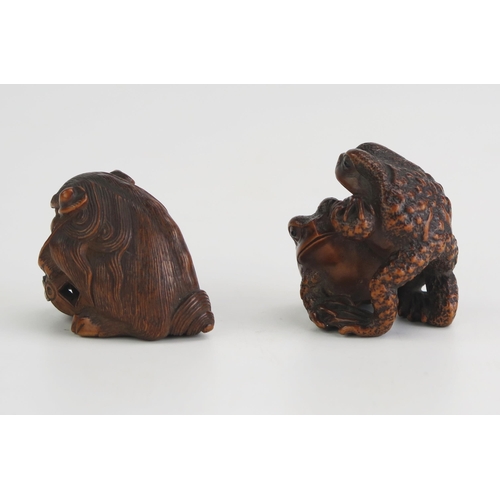 158 - A Japanese carved hardwood netsuke of two toads, signed, 3.5cm high, together with another boxwood n... 