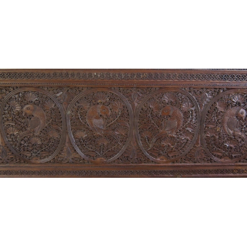 166 - A 19th Century Indian carved sandal wood table top casket, of rectangular outline, with lift off lid... 