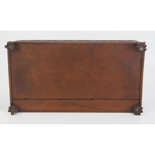 166 - A 19th Century Indian carved sandal wood table top casket, of rectangular outline, with lift off lid... 