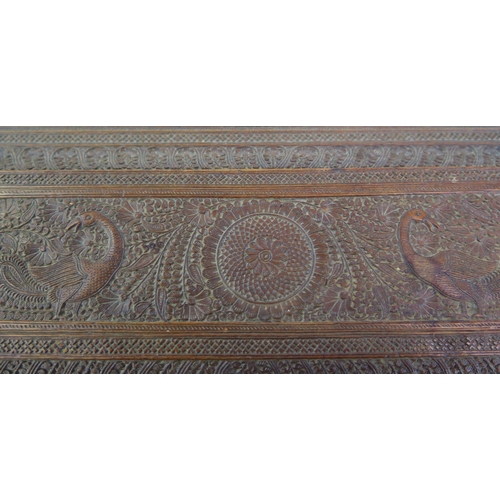 166 - A 19th Century Indian carved sandal wood table top casket, of rectangular outline, with lift off lid... 