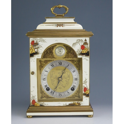 171 - A 20th century bracket clock by Elliot, decorated in the Chinoiserie taste, with domed caddy top wit... 