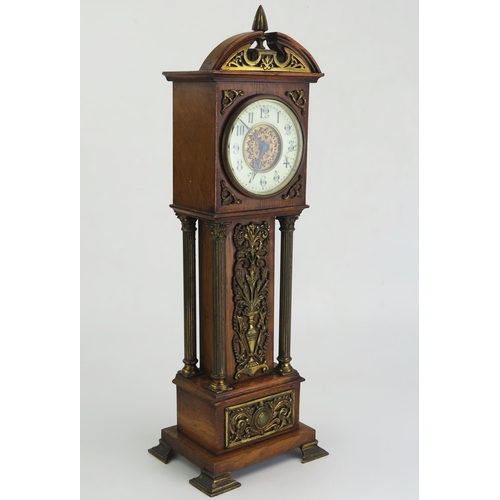 172 - An oak and brass mounted miniature longcase timepiece, of arched outline, with four reeded Corinthia... 