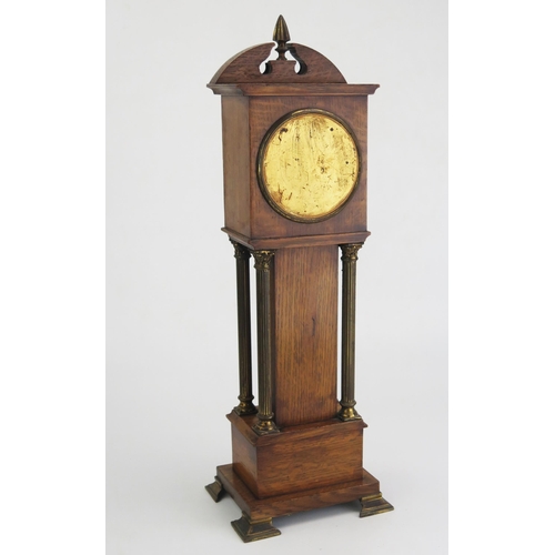 172 - An oak and brass mounted miniature longcase timepiece, of arched outline, with four reeded Corinthia... 