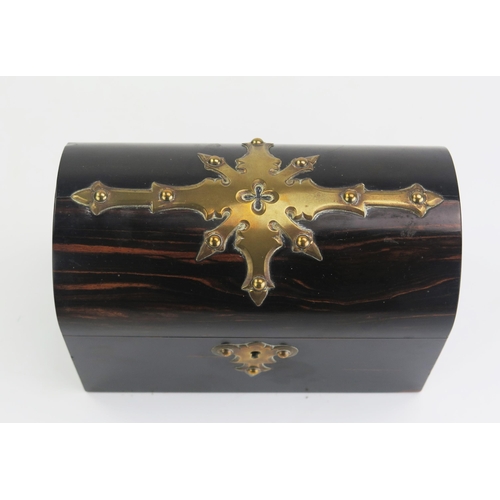 174 - A Victorian coromandel wood and brass mounted casket, of rectangular outline, with domed hinged lid,... 