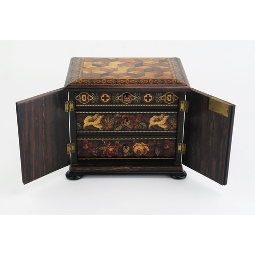 176 - A Tunbridge ware table top cabinet, of rectangular outline, with tumbling cube decoration and Berlin... 