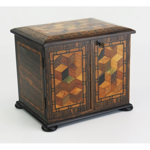 176 - A Tunbridge ware table top cabinet, of rectangular outline, with tumbling cube decoration and Berlin... 