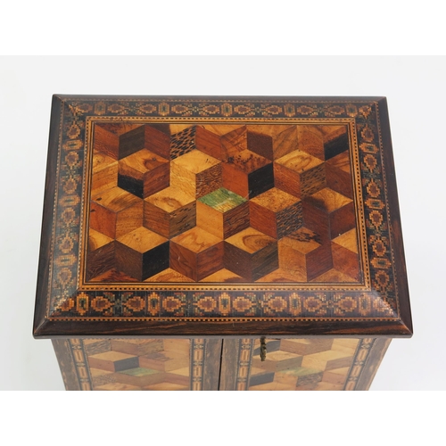 176 - A Tunbridge ware table top cabinet, of rectangular outline, with tumbling cube decoration and Berlin... 