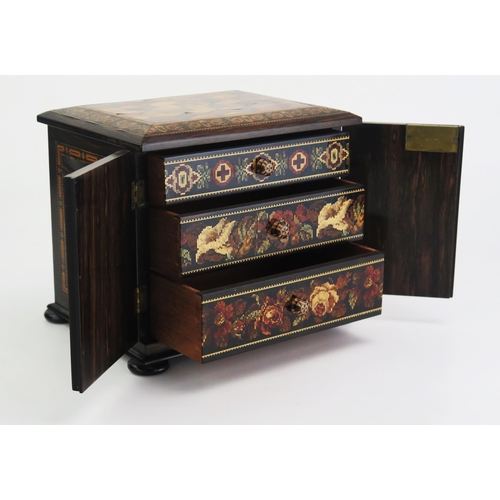 176 - A Tunbridge ware table top cabinet, of rectangular outline, with tumbling cube decoration and Berlin... 