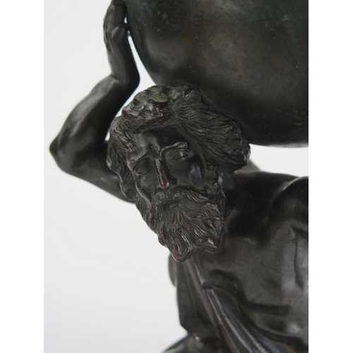 178 - A 19th century bronze study of a bearded, kneeling angel supporting a bowl, raised on a circular bas... 